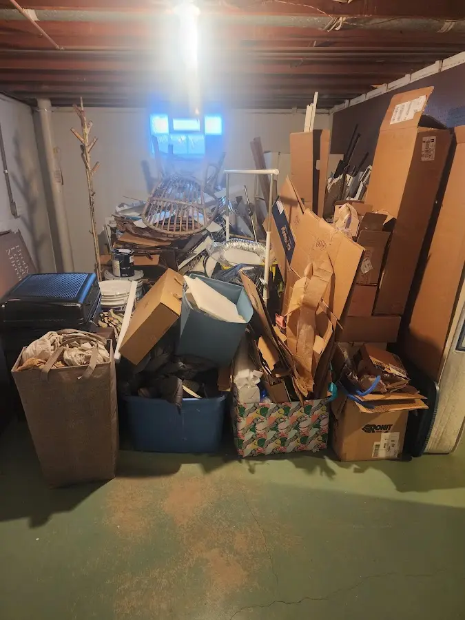 Roll-off dumpster container at job site for Roll Off Dumpster Rental in Pikeville